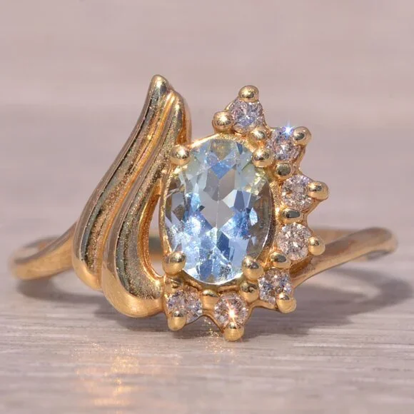 Aquamarine and Diamond Ring in 14 Karat Gold
